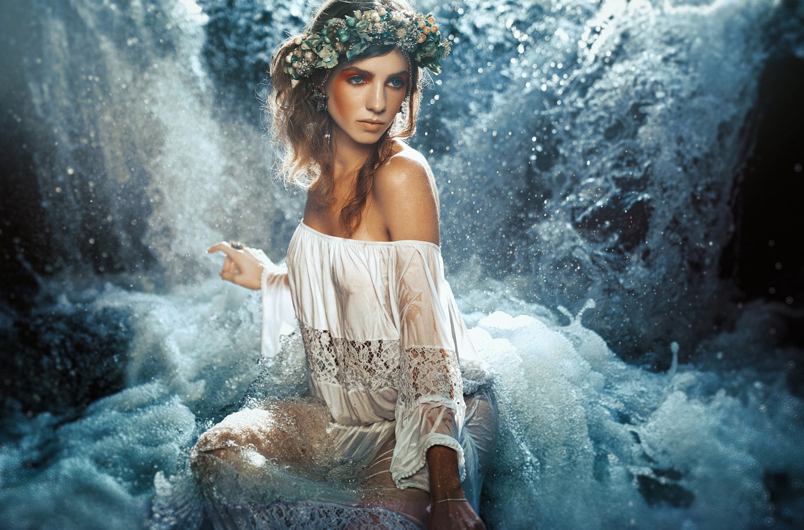 Fine art photography of a model posing in waterfalls