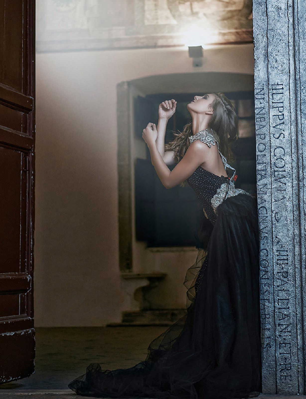 Fine art photography of a model wearing a black dress 