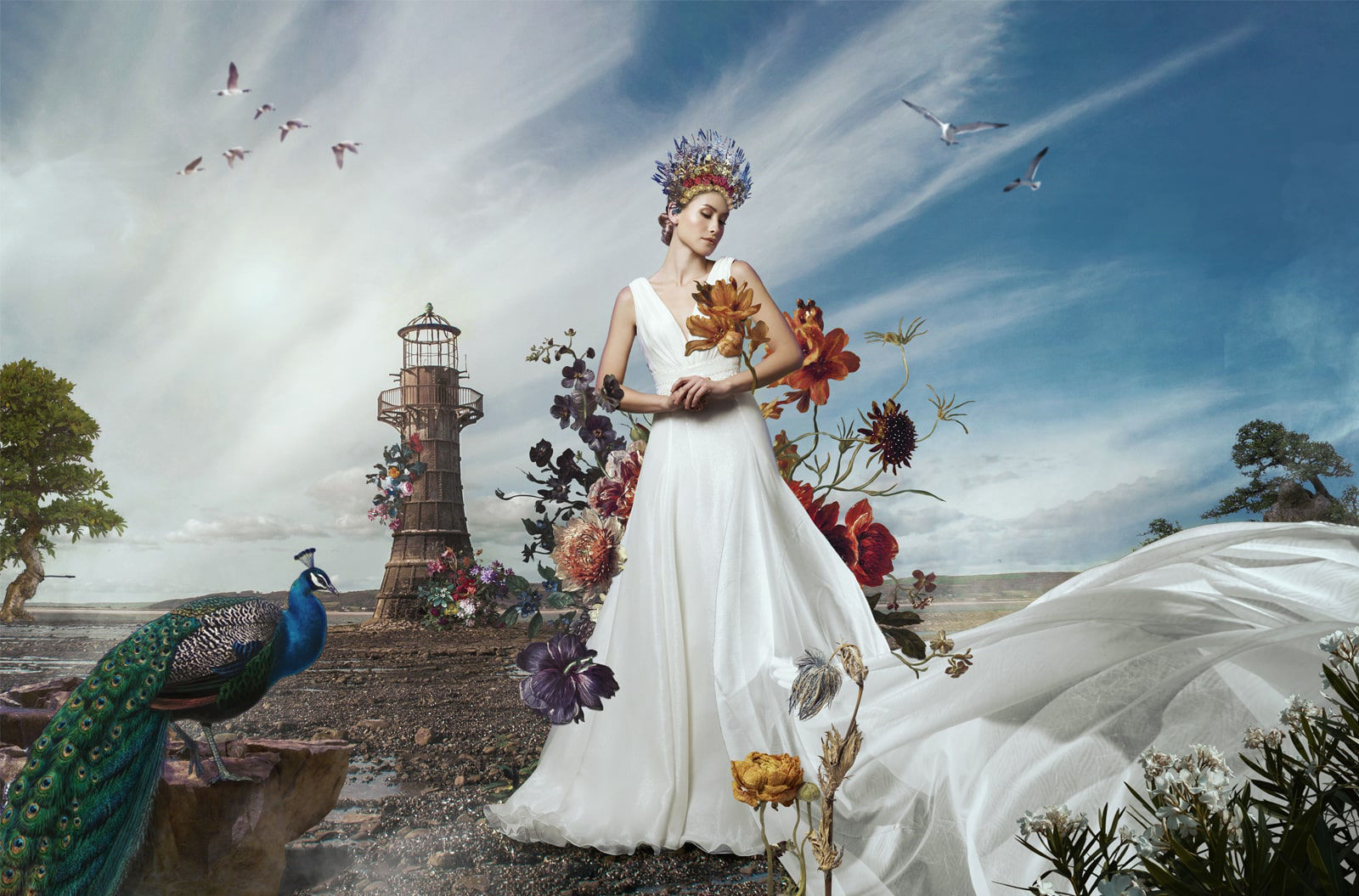 fine Art picture of a model wearing a white dress surrounded by flowers