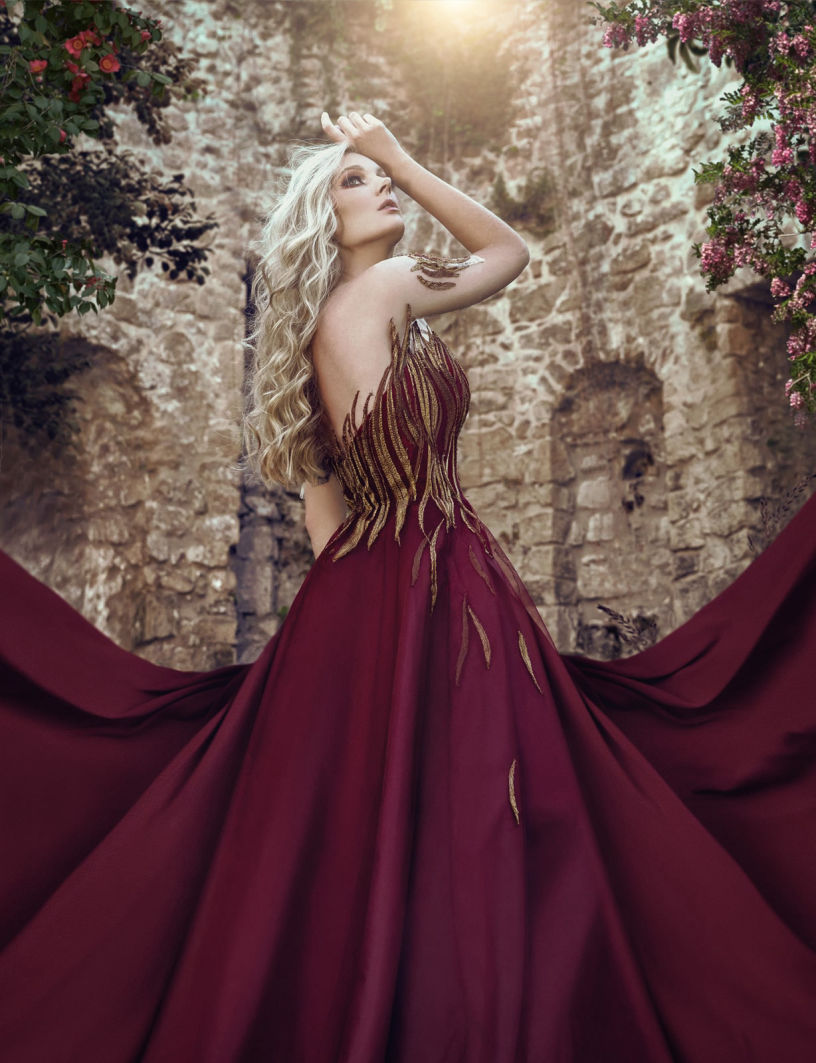 Fine art photography of a model wearing a red dress 